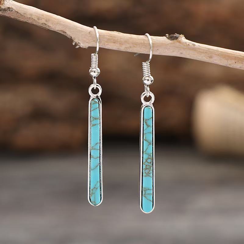 Elegante antiek verzilverde oorhangers met turkoois geometrisch patroon