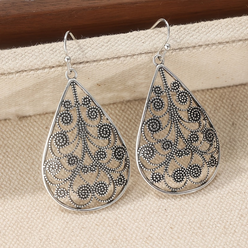 Elegante druppelvormige retro oorbellen met etnische draadprint