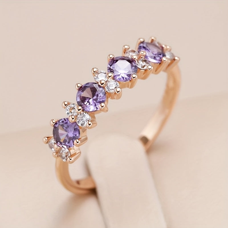 Elegante ring met paarse zirkonia en diamantaccent
