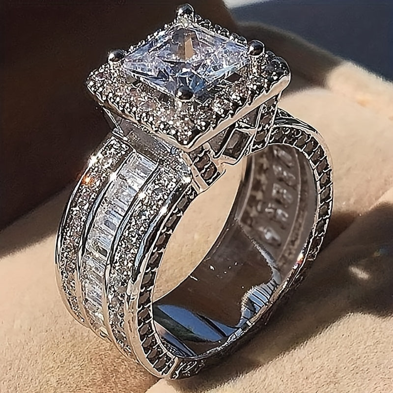 Elegante ring met vierkante zirkonia en radiant slijpsel
