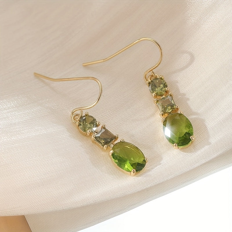 Vintage bohemien geometrische oorbellen met groen zirkonia