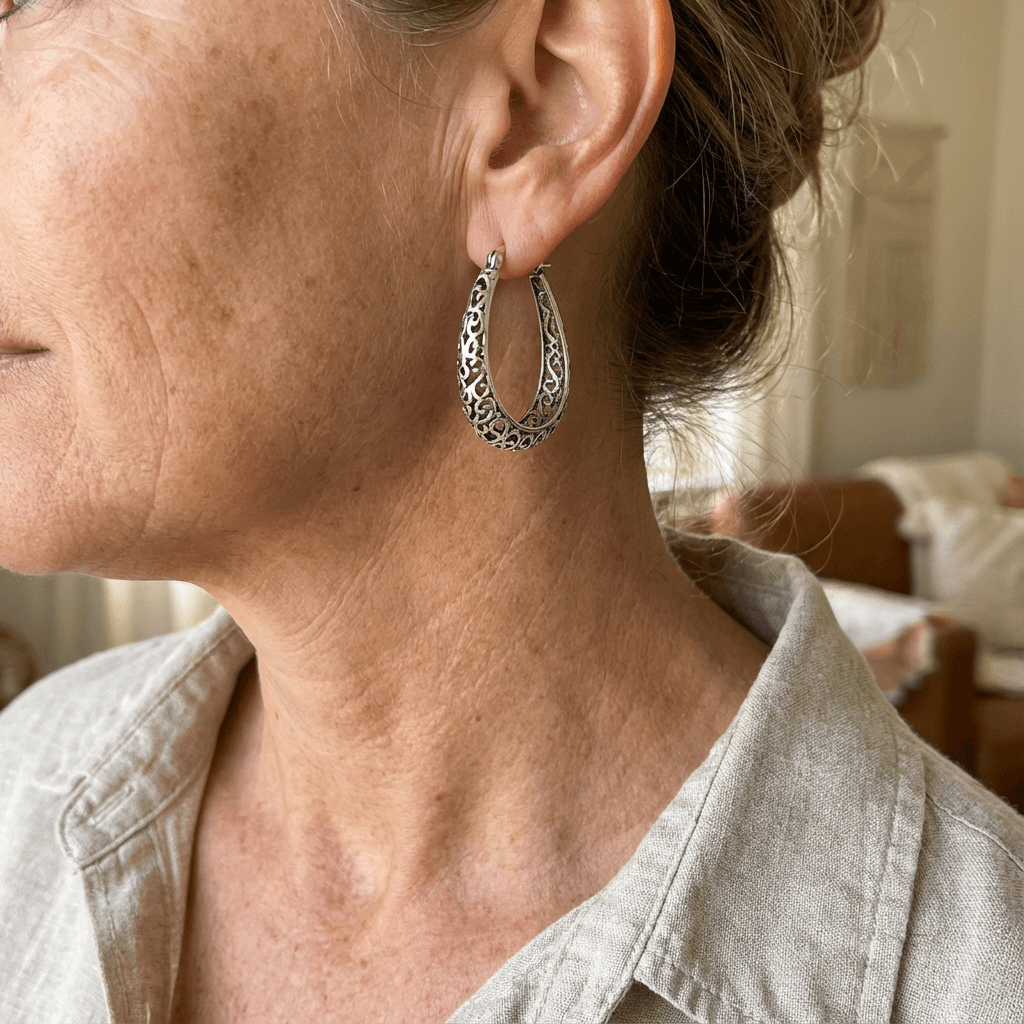 Elegante retro oorringen met krulmotief