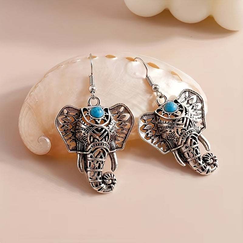Vintage verzilverde boho olifant oorhangers met turkoois