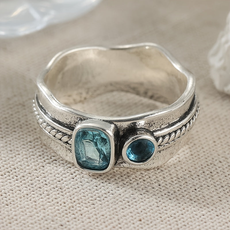 Minimalistische geometrische blauwe zirkonia ring met retro design