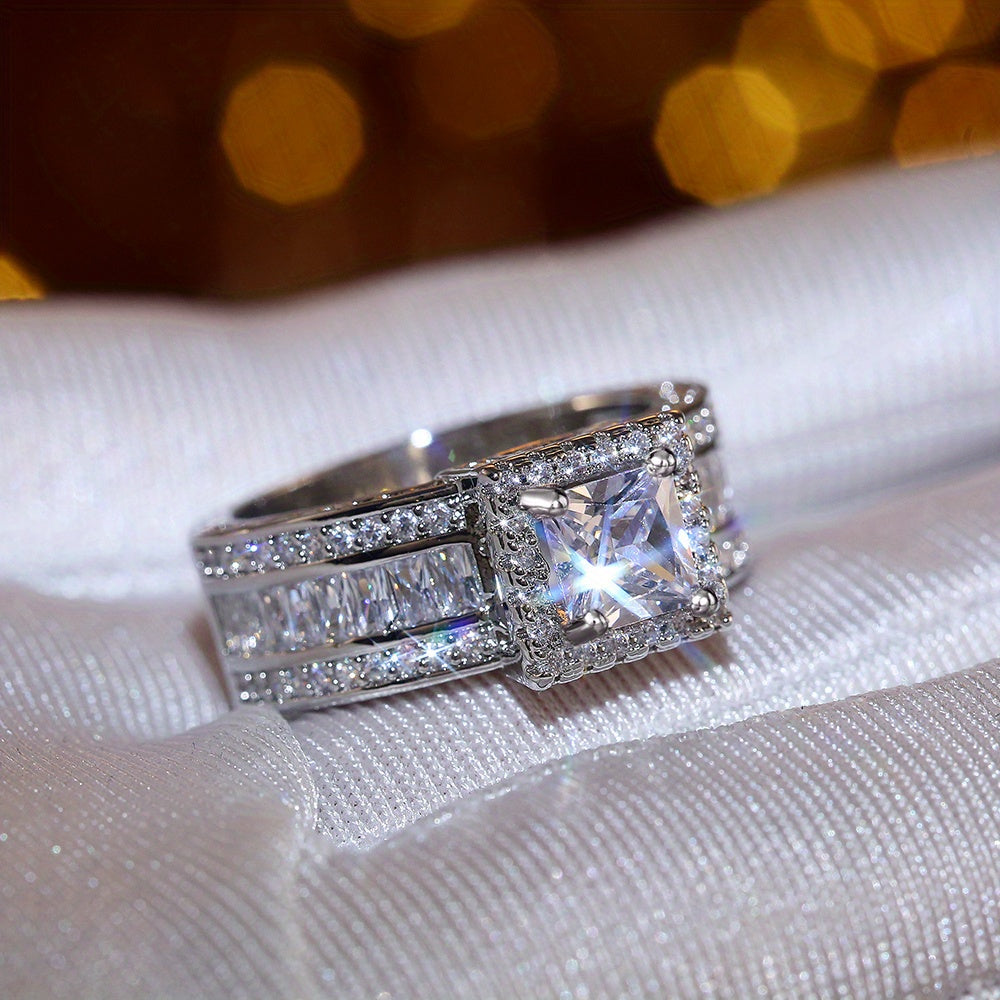 Elegante ring met vierkante zirkonia en radiant slijpsel