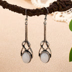 Vintage ambachtelijke oorhangers met rond glas en zinklegering