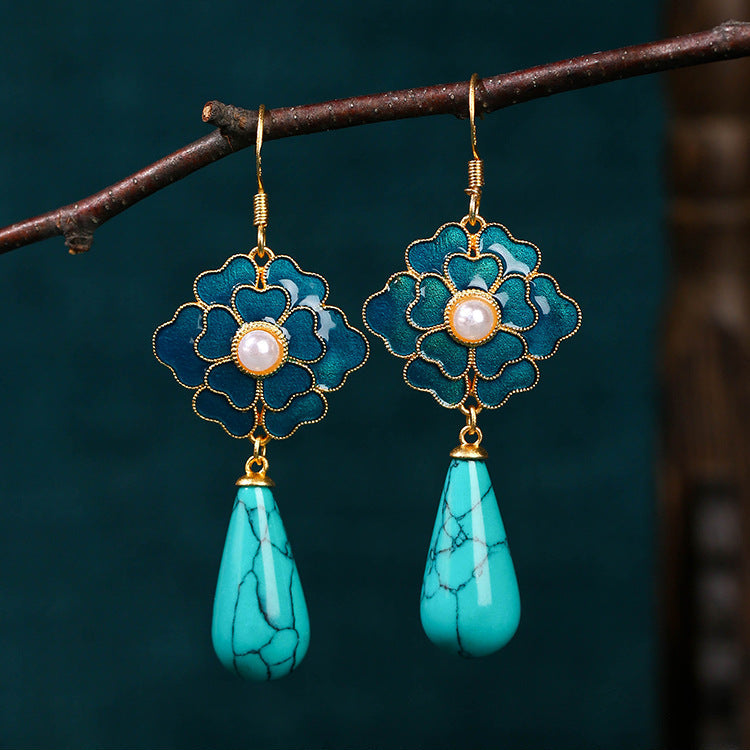 Elegante vintage oorhangers met turkoois bloemmotief en parel