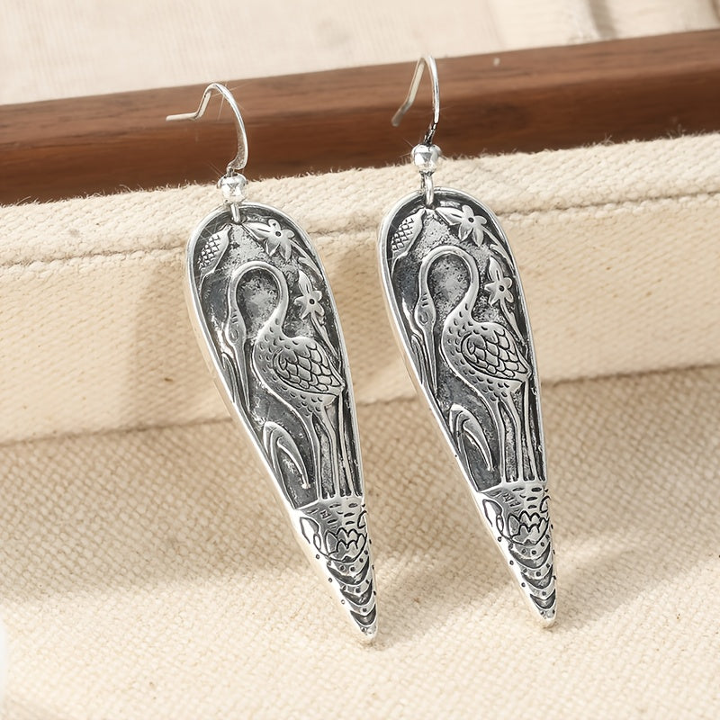 Elegante oorhangers met reigermotief