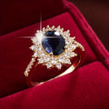 Vionne goudkleurige ring met saffier
