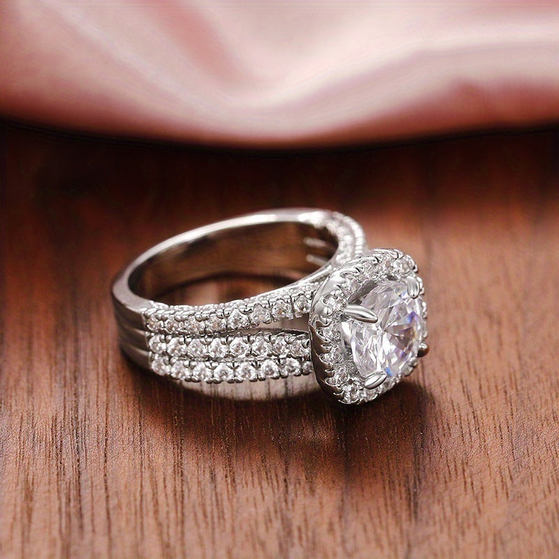 Elegante ringen met enkele zirkonia steen en micro pavé zijkant