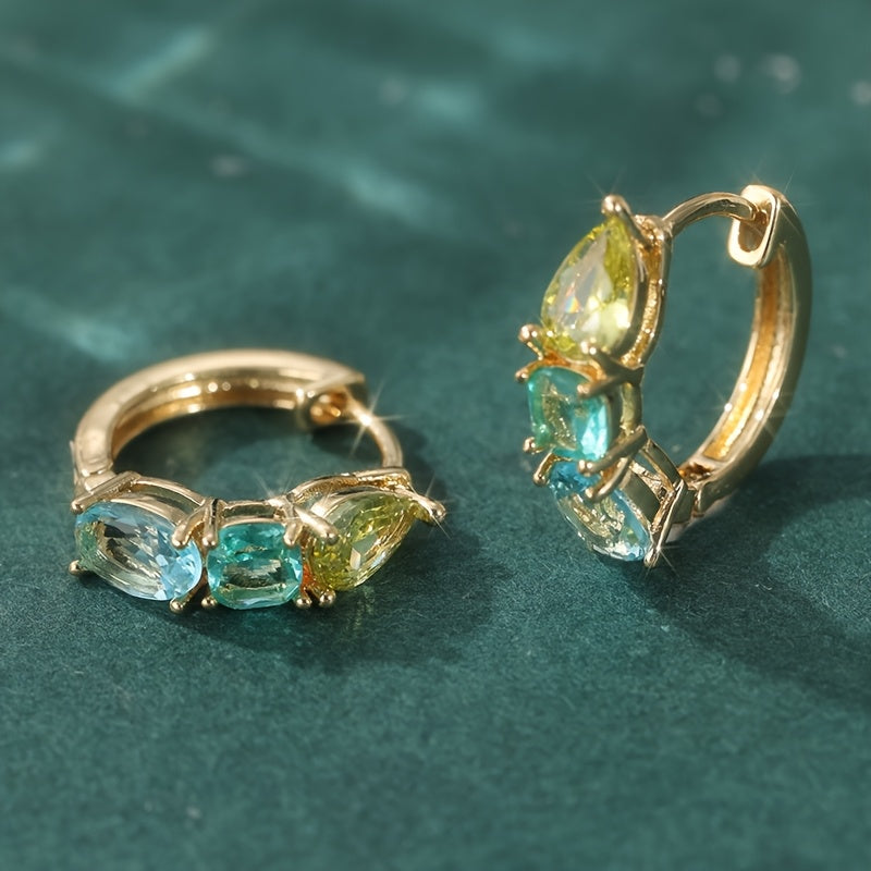 Franse ronde oorbellen met blauwgroene zirkonia