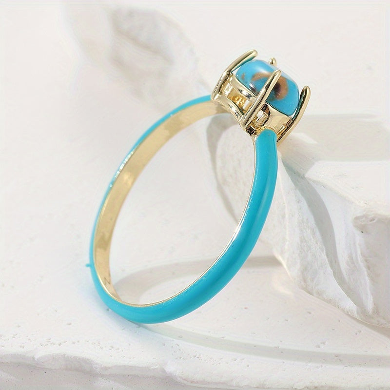 Vintage vergulde ring met geëmailleerd geometrisch ovaal turkoois