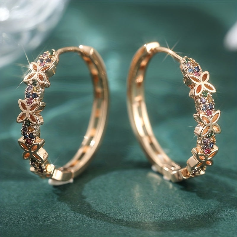 Elegante bohemien oorbellen met meerkleurige zirkonia bloem en vlinder