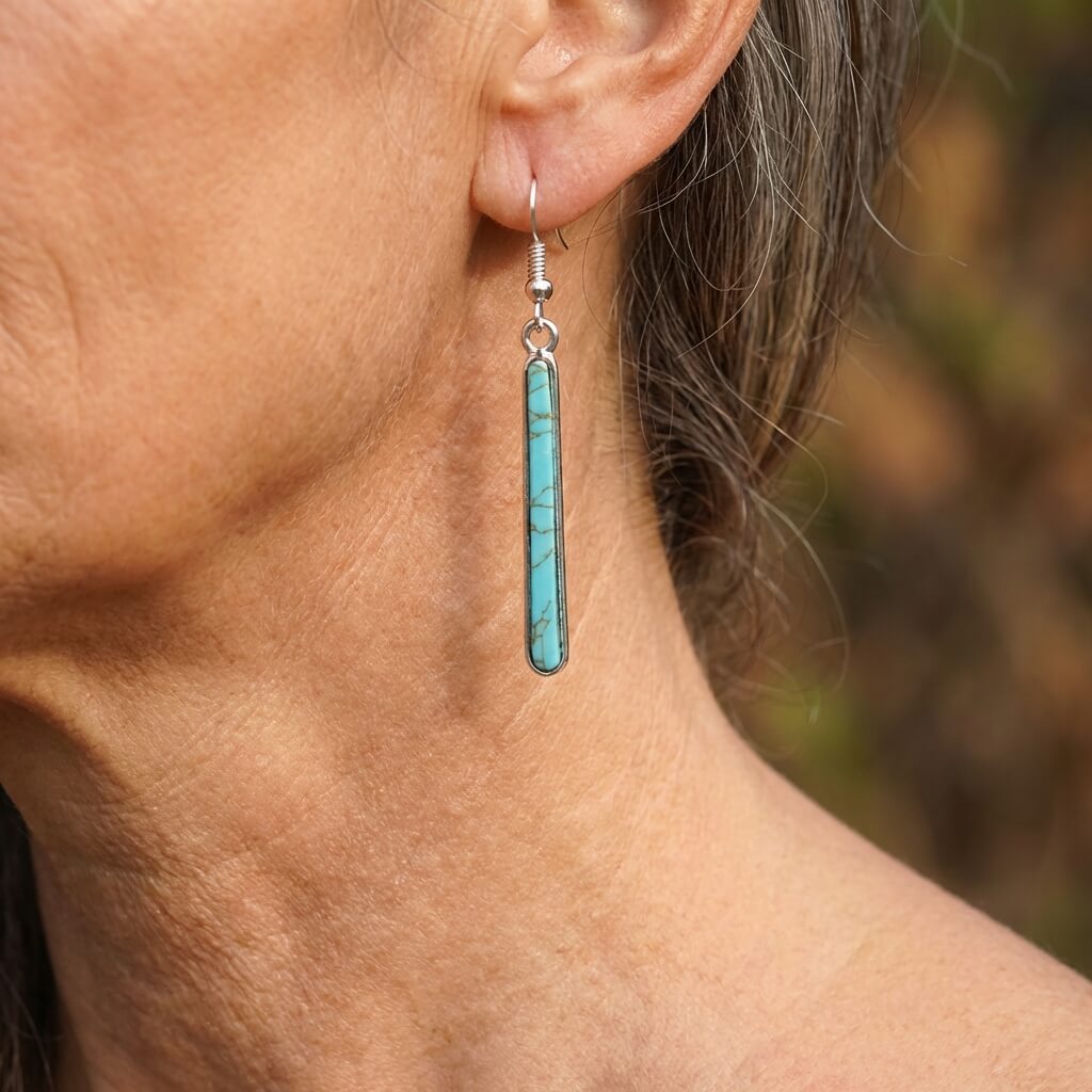 Elegante antiek verzilverde oorhangers met turkoois geometrisch patroon