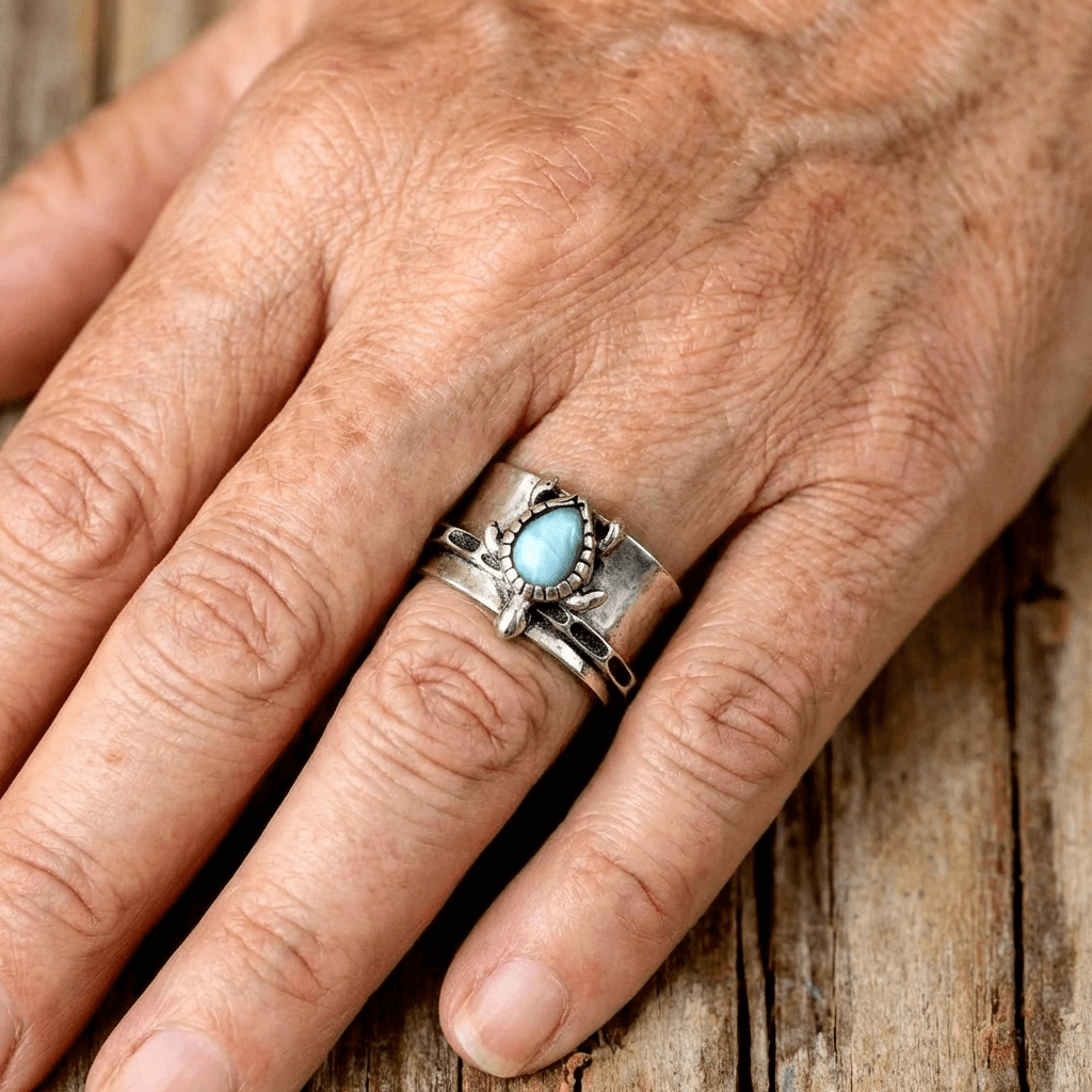 Elegante zilverkleurige statement fidget ring met schildpad en larimar