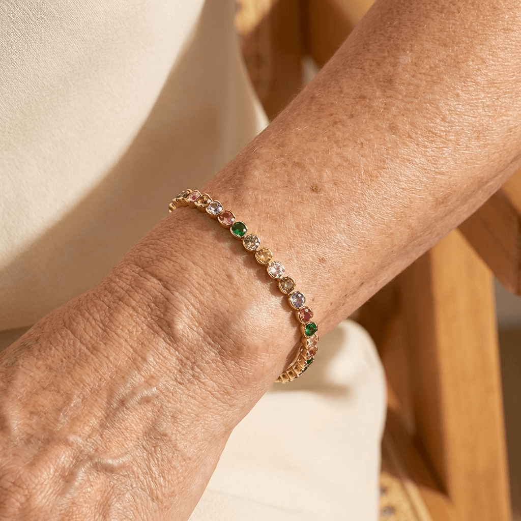 Elegante vergulde tennisarmband met meerkleurige edelstenen