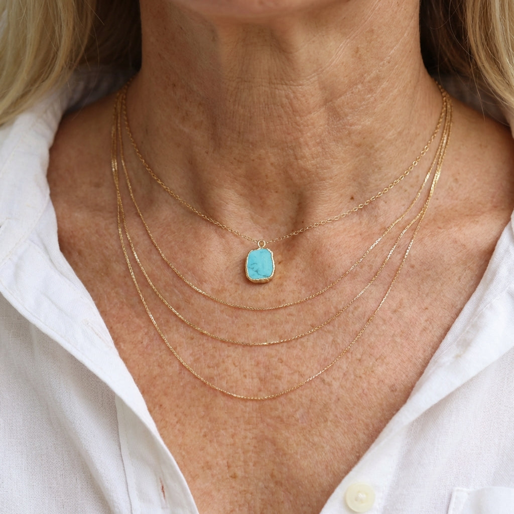 Elegante vergulde ketting met turkooizen edelsteen