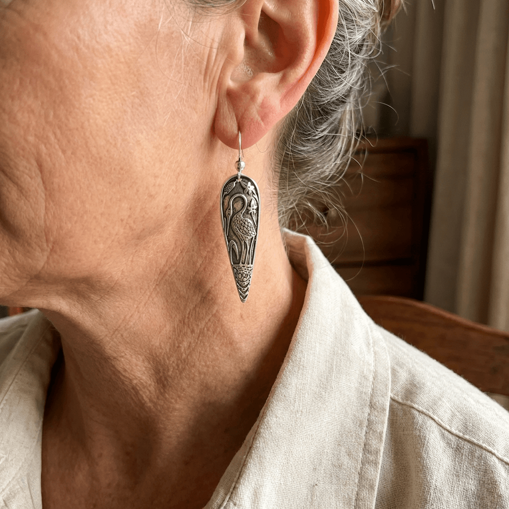 Elegante oorhangers met reigermotief