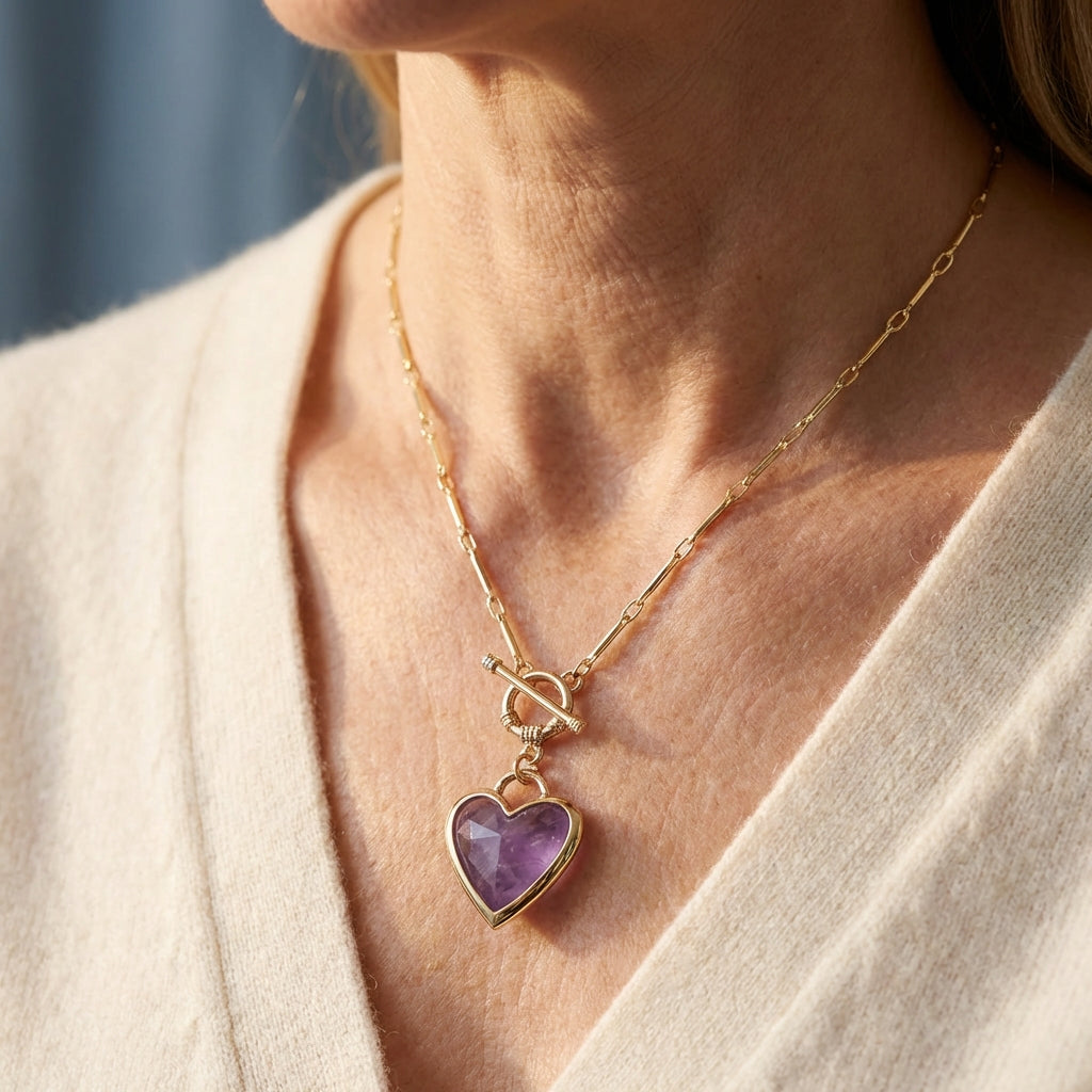 Elegante vergulde schakelketting met liefdesband