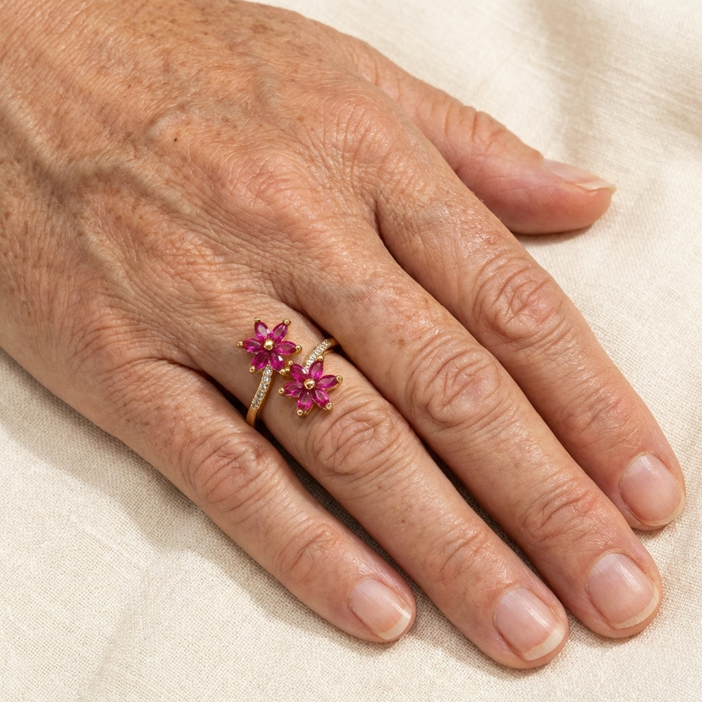 Elegante vintage wikkelring met zirkonia en robijnen bloem