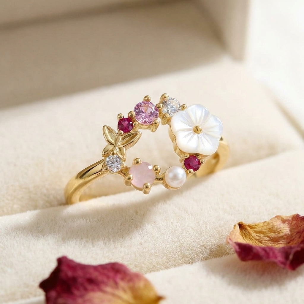 Elegante vlinderring met bloem, imitatieparel en micro-ingelegde zirkonia