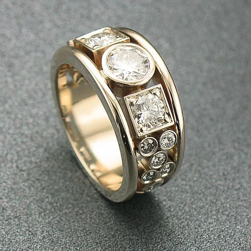 Elegante vintage goudkleurige ring met meerdere zirkonia stenen