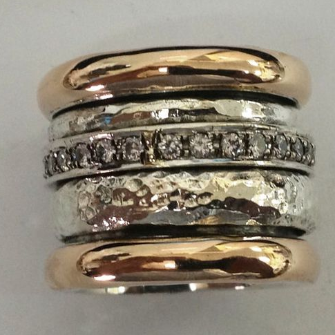 Dikke vintage ring in goudkleurig en zilverkleurig
