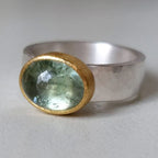 Vintage sterling zilveren en goudkleurige kastring met groene toermalijn