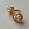 Vintage oorbellen met parelnest