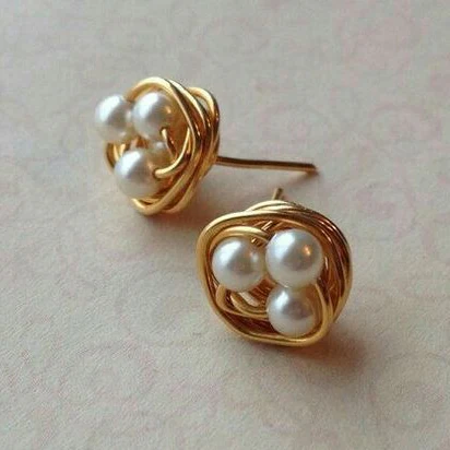 Vintage oorbellen met parelnest