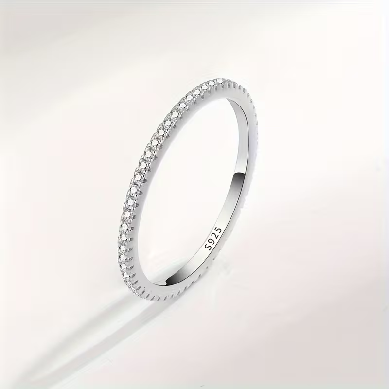 Goudkleurige gipskruid cirkelring met zirkonia