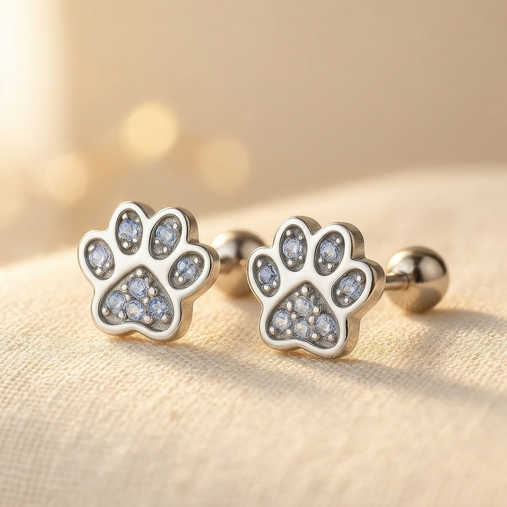 Silver paw print button earrings