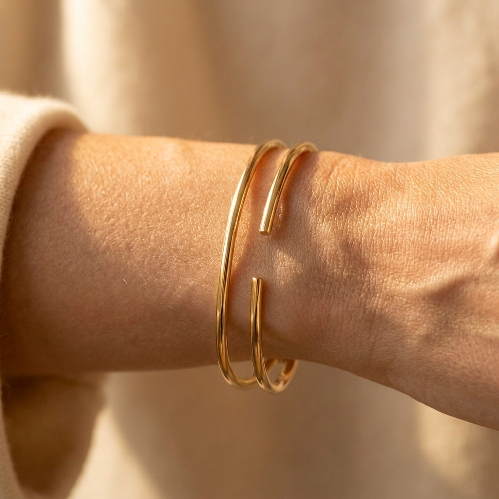 Goudkleurige gedraaide open cuff armband