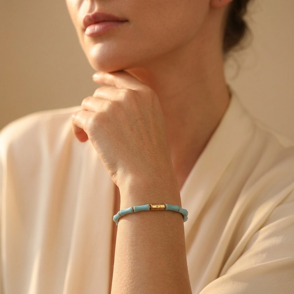 Vergulde armband met turkoois tonkralen