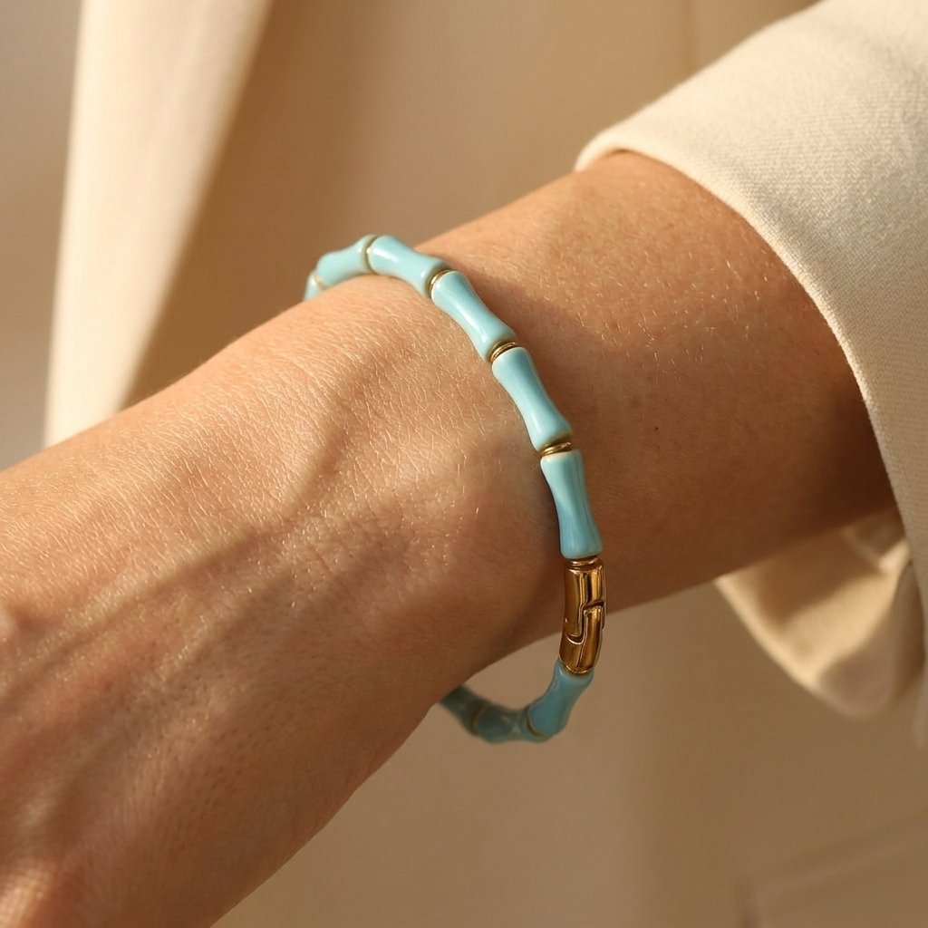 Vergulde armband met turkoois tonkralen