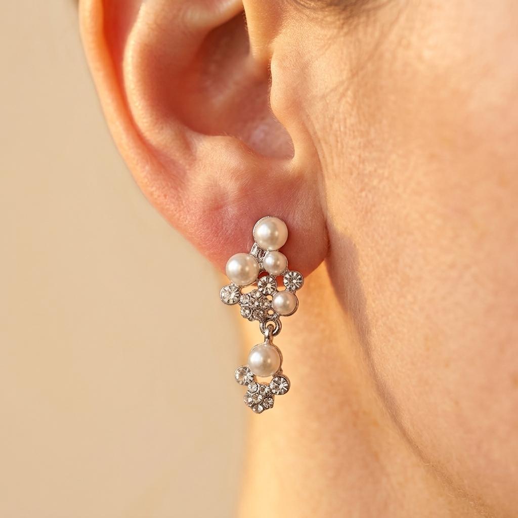 Elegante goudkleurige parel sieradenset met ketting en oorbellen