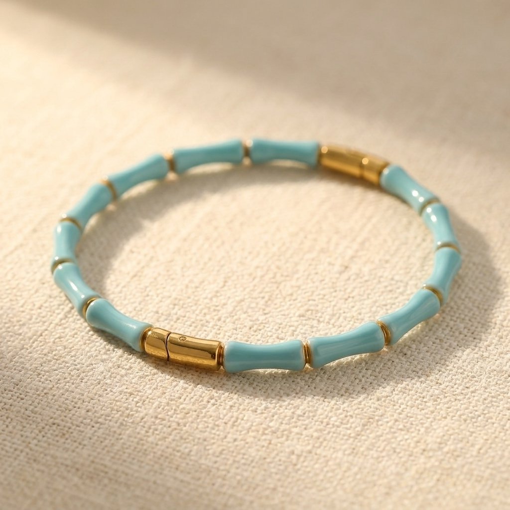 Vergulde armband met turkoois tonkralen