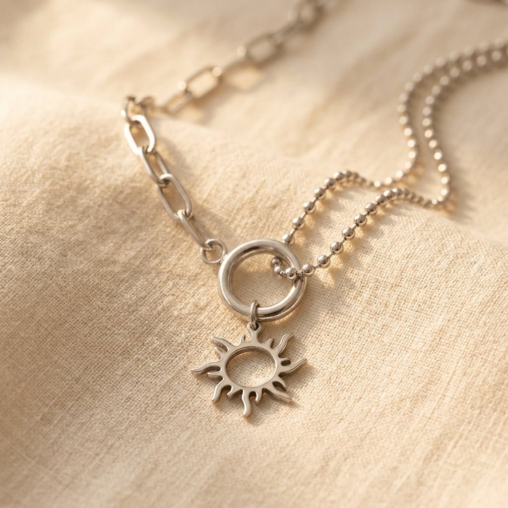 Vintage zilverkleurige asymmetrische schakelketting met zonhanger