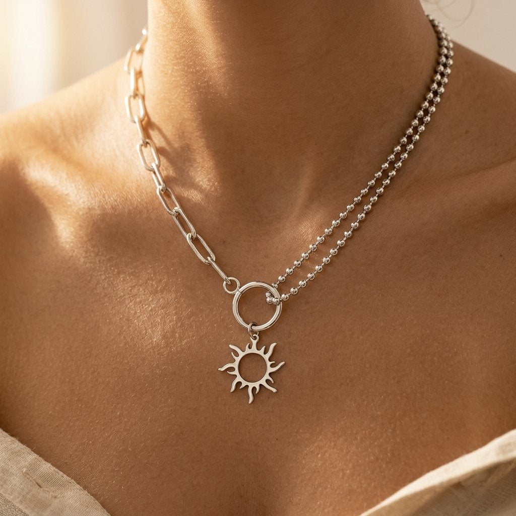Vintage zilverkleurige asymmetrische schakelketting met zonhanger