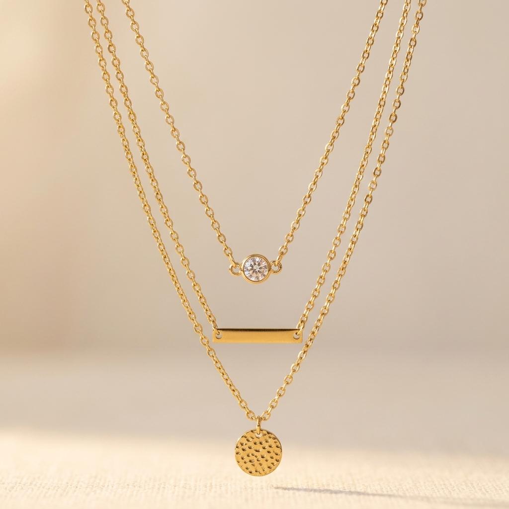 Goudkleurige gelaagde ketting met ronde hanger
