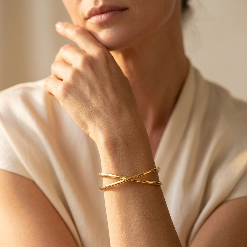 Goudkleurige gedraaide open cuff armband
