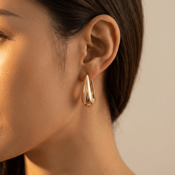 Elegant Gold Polished Teardrop Hoop Earrings