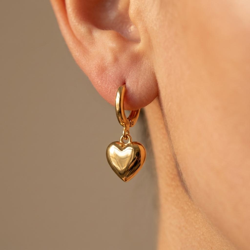 Gevormde goudkleurige sieradenset met ketting en oorbellen