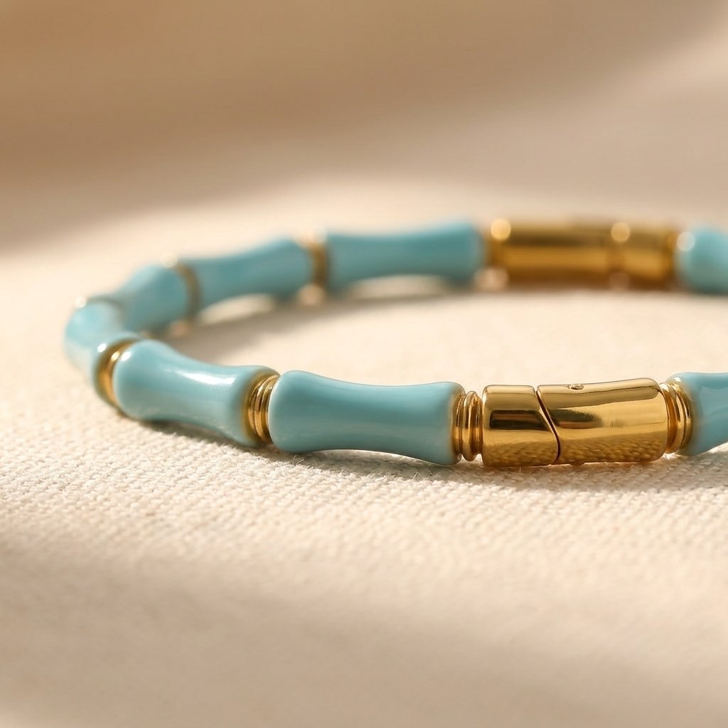 Vergulde armband met turkoois tonkralen